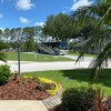 RV Lot for Sale: Central Florida Class A RV Community Large Lot on Pond with Pad and Full Utilities, Polk City, FL