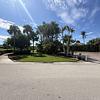RV Lot for Sale: Luxury Motorcoach Lot with Lake Views, Custom Tiki & Exceptional Privacy, Port St. Lucie, FL