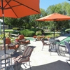 Just off the Registration Office, Travelers Find Comfortable Patio Oasis