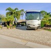 RV Lot for Sale: Turnkey RV Lot with Premium Tiki and Stunning Lake Views, Port St. Lucie, FL