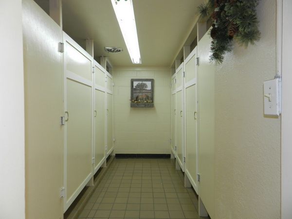 Men's: 4 Showers, 4 Sinks, 3 Toilets, 1 Urinal; Women's: 4 Showers, 4 Sinks, 4 Toilets