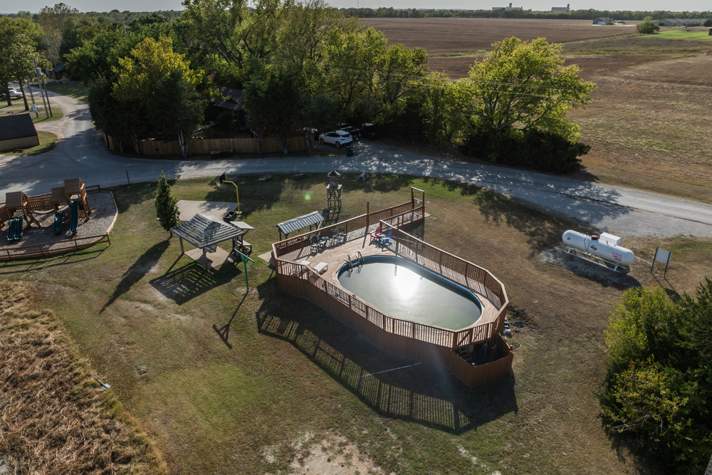 Pool with desk, gazebo, mining playlet, basketball court.