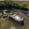 Pool with desk, gazebo, mining playlet, basketball court.