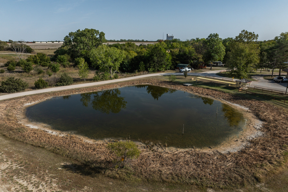 Fishing pond with dock.