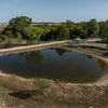 Fishing pond with dock.