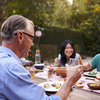 seniors outdoor meal party