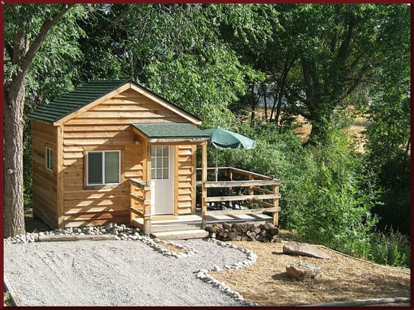 Creekside Cabin Rental: Adjacent to Cedar Creek with a Wrap-around Deck