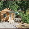 Creekside Cabin Rental: Adjacent to Cedar Creek with a Wrap-around Deck