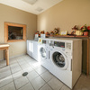 Laundry room. Coin machines.