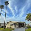 Mobile Home for Sale: Easy Access to Amenities With Large Private Workspace Garage, Mulberry, FL