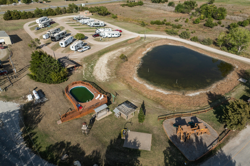 North side of campground. Barn, gazebos, pool with deck, mining play set, basket ball court, brand new play set, horse shoes, shuffle board.