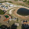North side of campground. Barn, gazebos, pool with deck, mining play set, basket ball court, brand new play set, horse shoes, shuffle board.