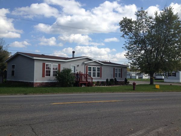Double wide home by main entrance.