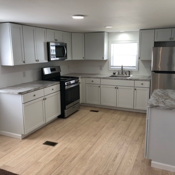 Photo of REDONE Inside and Out, with new appliances and 2 patios on a quiet street