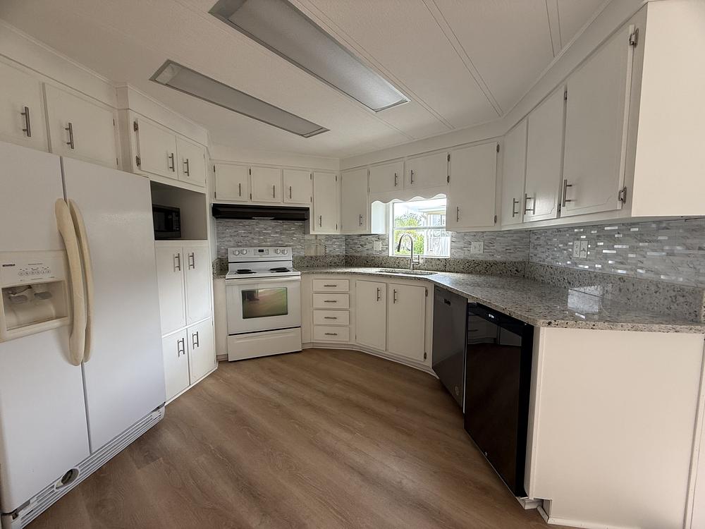 Camelot Lakes Village