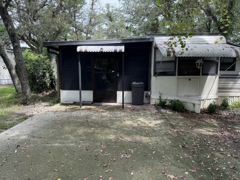 Photo of Rv with Florida room, shed, parking and pool community