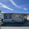 Mobile Home for Sale: Cozy 2 Bed/2 Bath with Enclosed Air-Conditioned Porch, Largo, FL