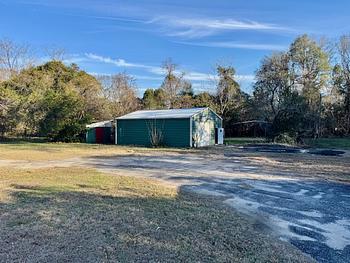 Photo of Spacious Lot with a Couple Buildings! No Credit Check!