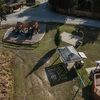 Gazebo, mining play set, basket ball court and brand new play set.